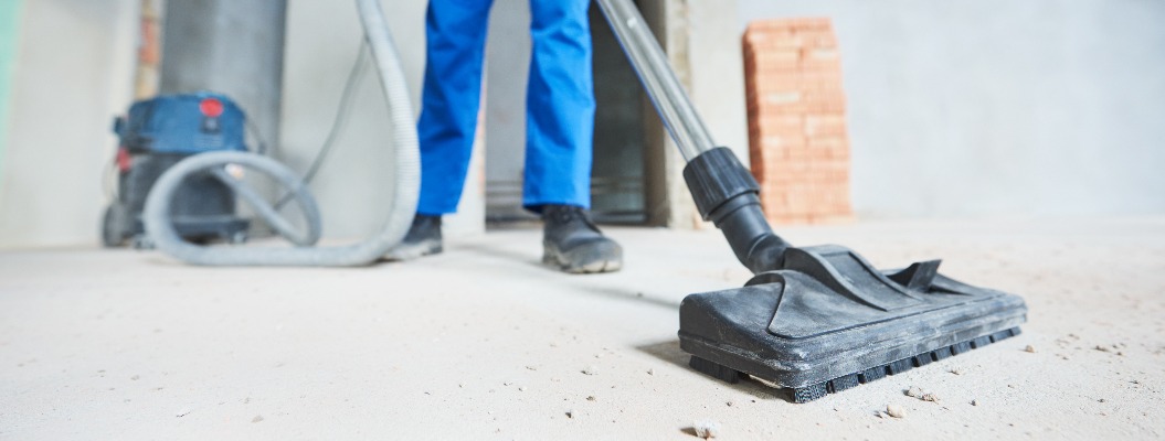 construction cleaning service. dust removal with vacuum cleaner